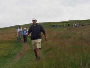 Paul leads away from Top Withens