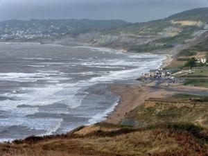 Looking back on Charmouth with Lyme Regis in the distance